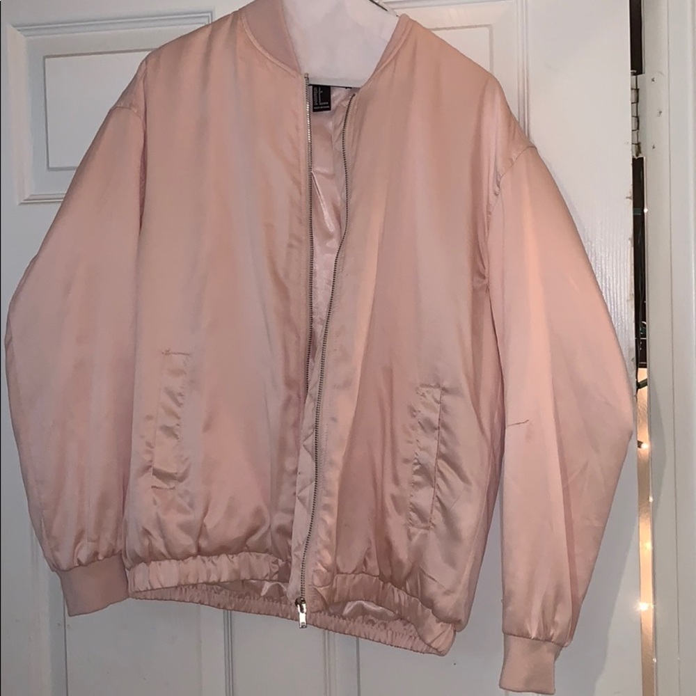 Pink fluffy jacket.